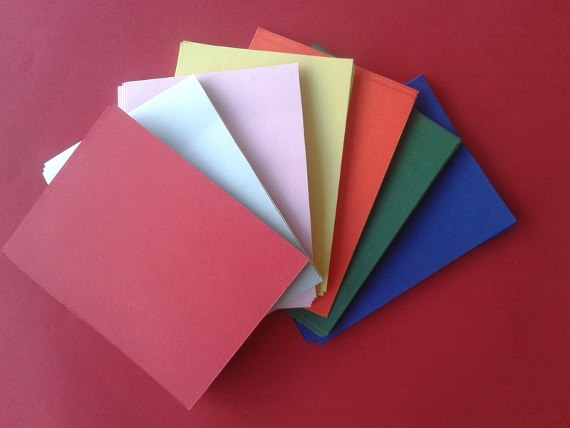 memos, copy space, assorted, books, still life, colored background, high angle view, pile, multi colored, studio shot, colored, directly above, variation