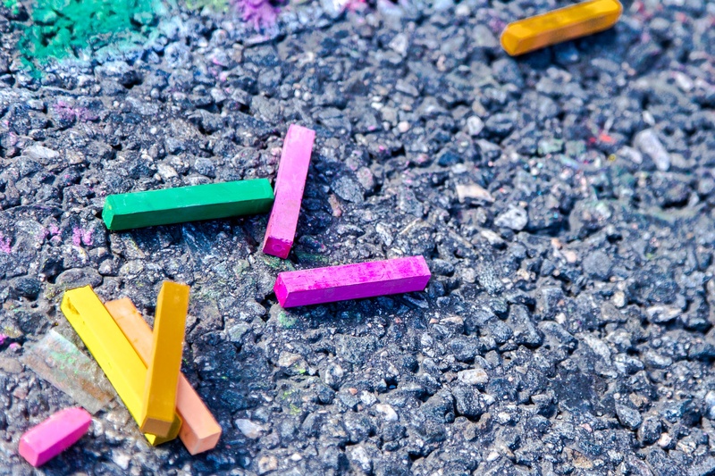 group of objects, painting, high angle view, sidewalk, multi colored, chalk - art equipment, wood - material, creativity, gray, creative, nature, colored