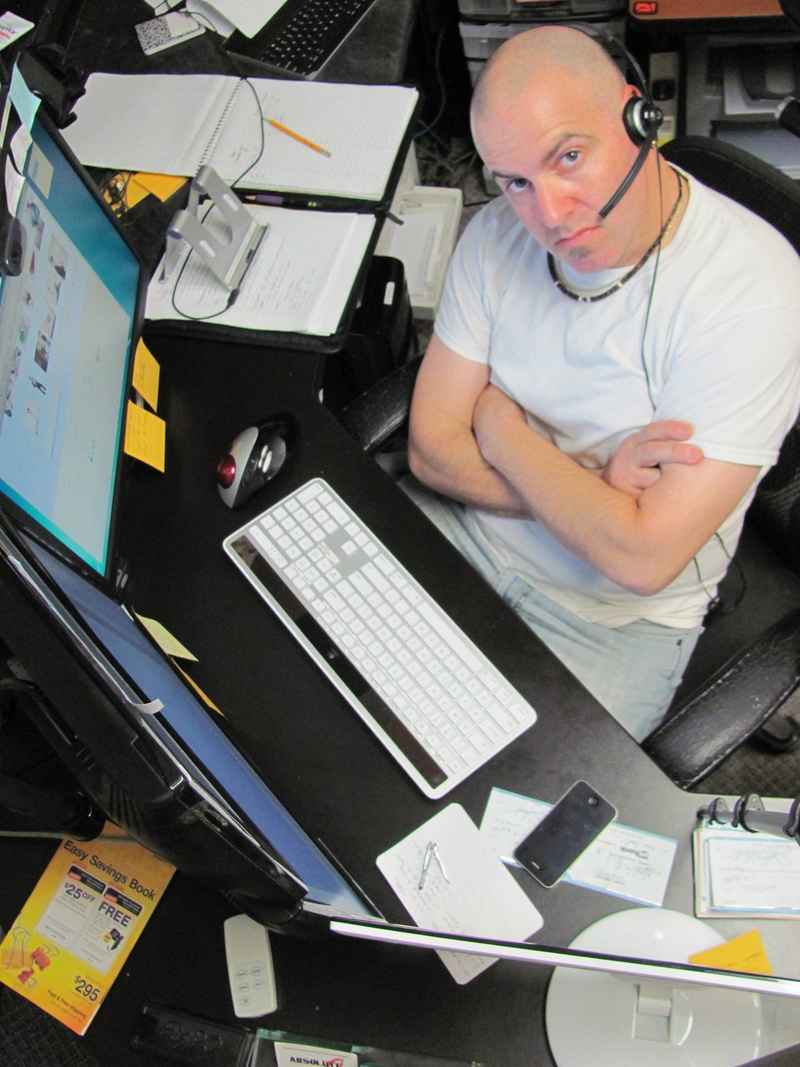 occupation, person, high angle view, pc, sitting, wearing, computing, 1080P, paperwork, indoors, customer service, table, working, front view, computer