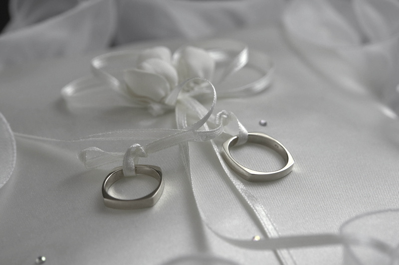 wedding Ring, indoors, jewelry, still life, event, dedication, white, textile, selective focus, life events, elegance, emotion, two, personal accessory