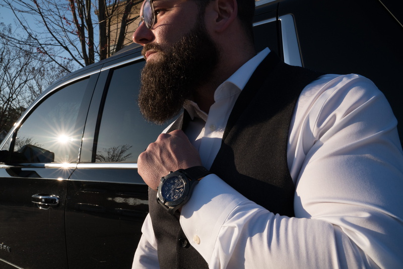 mode of transportation, transportation, 8K, outdoors, lifestyles, motor vehicle, greenville, males, technology, watch, tie, suit, holding, class, car