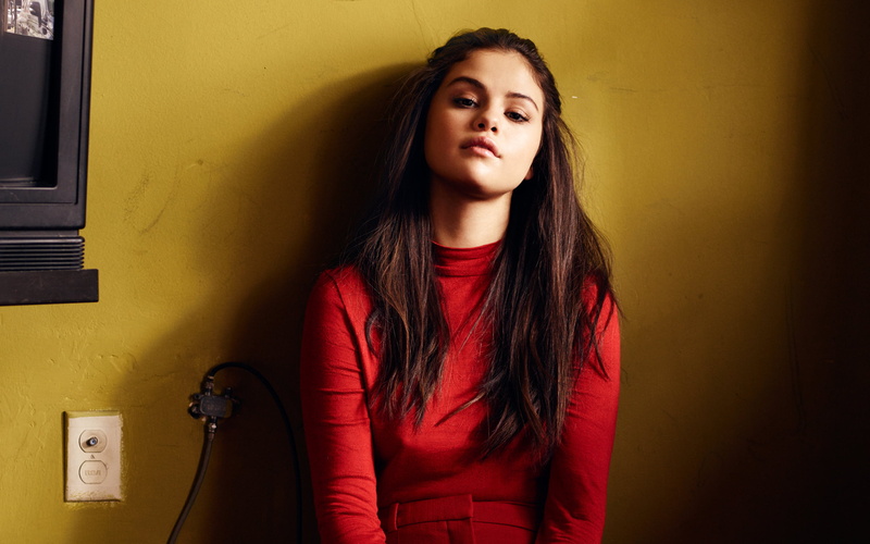 brown hair, long hair, contemplation, young women, beautiful woman, InStyle, wall - building feature, in red, brunette, actress, hair, waist up, Selena Gomez