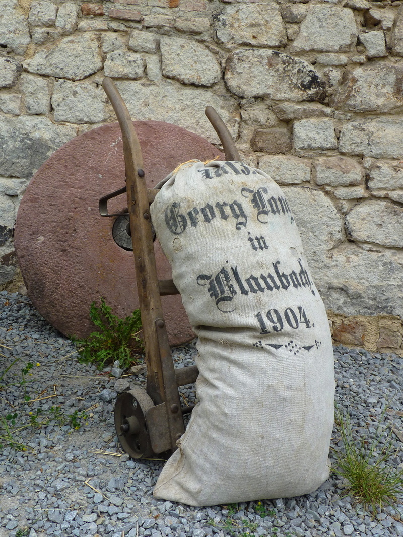 agriculture, outdoors, close-up, Flour, stone wall, art and craft, no people, architecture, metal, cereals, Sack, day, sack truck, communication, grind