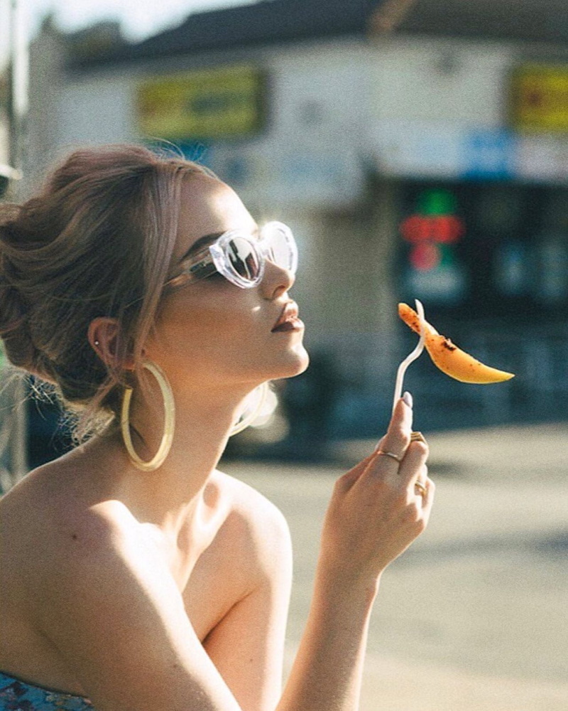 hoop earrings, long hair, brunette, lipstick, earring, long nails, looking below, 720P, young woman, rings, glasses, building, sunlight, hairbun, makeup