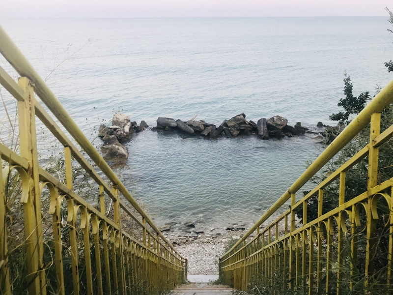 beach, 4K, horizon over water, downstairs, rocks, beauty in nature, railing, scenics - nature, outdoors, sea, water, varna, tranquility, rock, plant, architecture