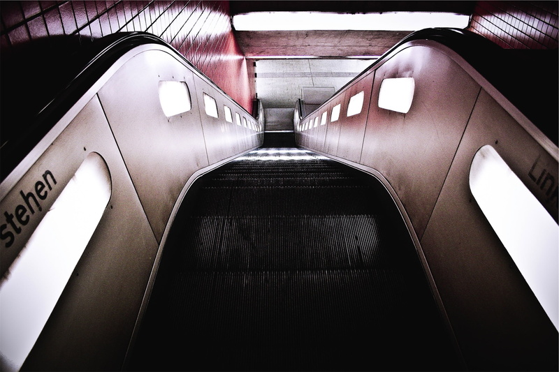 built structure, public transportation, modern, subway, indoors, railing, empty, downstairs, travel, public transport, staircase, ceiling, station, underpass