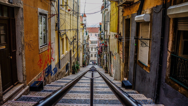 travel, city, stairway, day, direction, transportation, houses, narrow, built structure, footpath, facades, house, buildings, banister, residential district