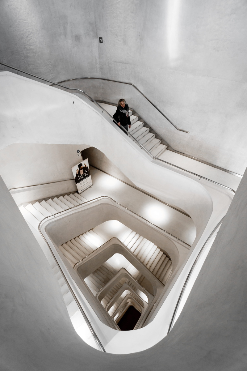 black, moving down, person, standing, ceiling, 5K, built structure, indoors, building, inside, one person, stair, day, leisure activity, high angle view