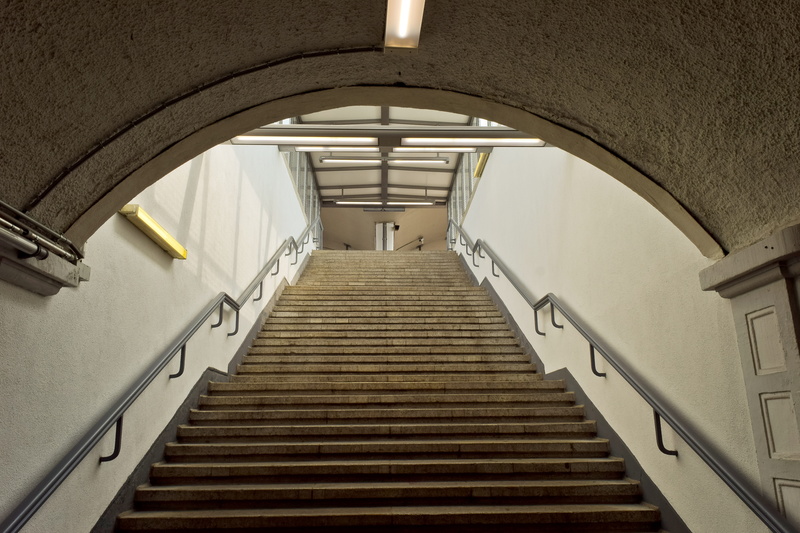 illuminated, indoors, arch, lighting equipment, handrail, no people, 5K, staircase, travel, day, underpass, the way forward, urban, wall - building feature