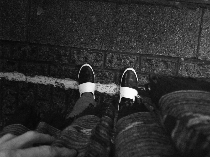 human limb, selective focus, high, leather, 2K, one person, road, jeans, architecture, shoes, lifestyles, women, match, real people, street, leisure activity