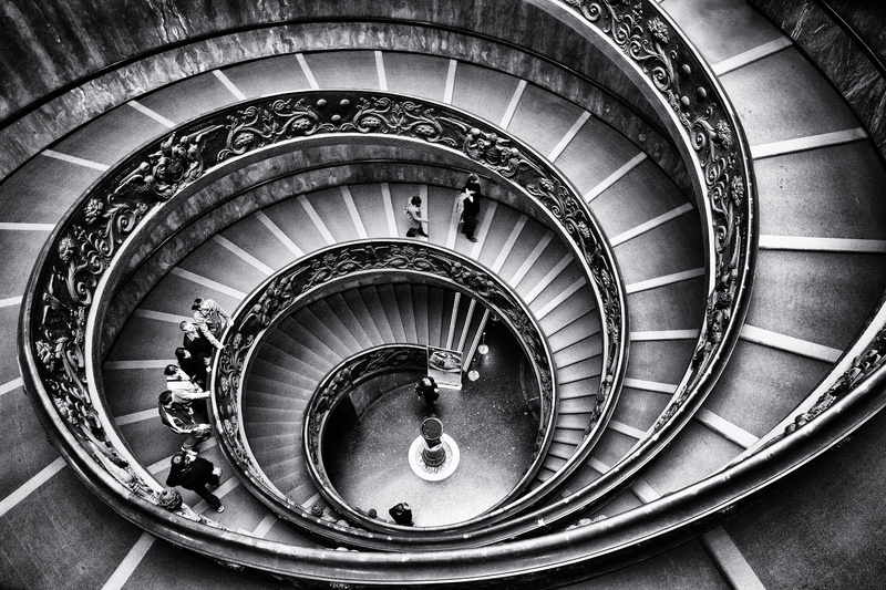 steps and staircases, built structure, railing, black and white, day, architecture, women, pattern, directly above, one person, people, indoors, geometry