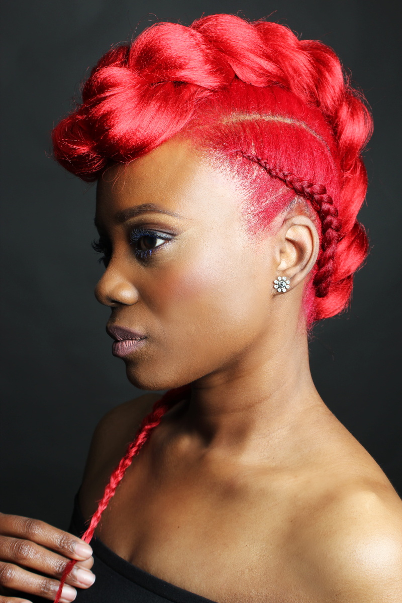 hairstyle, woman, female red cornrow, wear, portrait, front view, one person, black background, indoors, young adult, lifestyles, cornrow, close-up, beautiful woman