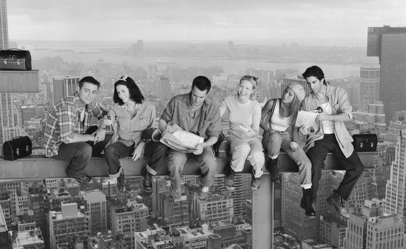 lifestyles, sitting, men, grayscale, built structure, front view, group of people, full length, Movies, crowd, sky, photo, women, casual clothing, day
