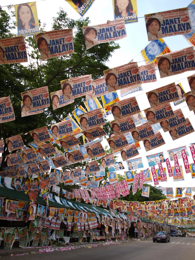 election, hanging, choice, large group of objects, built structure, party, poster, banner, no people, democratic, market stall, communication, day, text