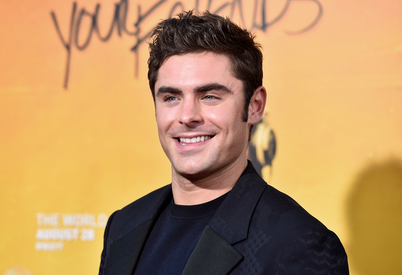adult, front view, beautiful people, yellow, young men, young adult, zac efron, efron, smiling, indoors, one person, happiness, looking at camera, wall - building feature