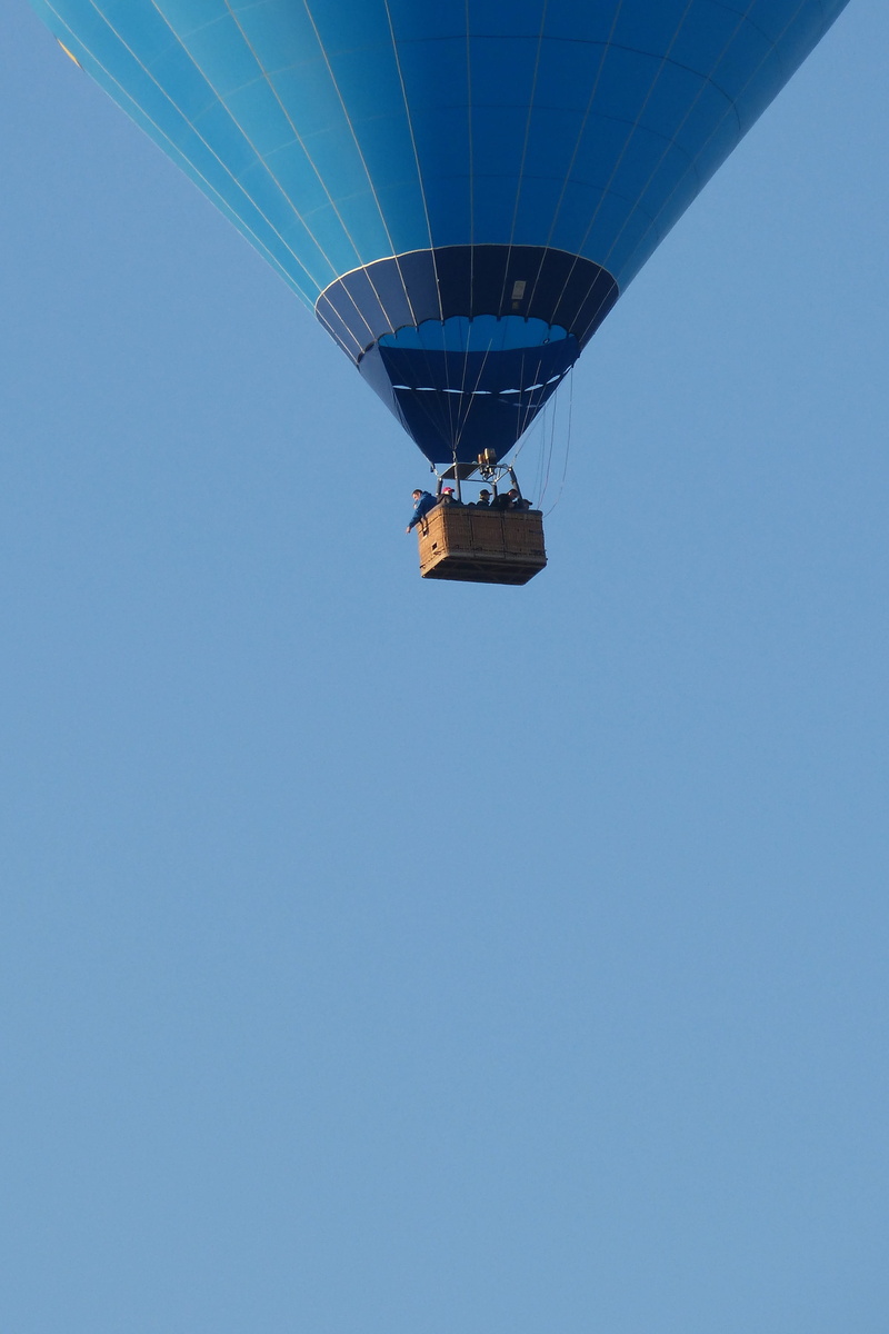 air, low angle view, hot, built structure, transportation, extreme sports, flying, air vehicle, architecture, mid-air, travel, balloon, gas tank, adventure