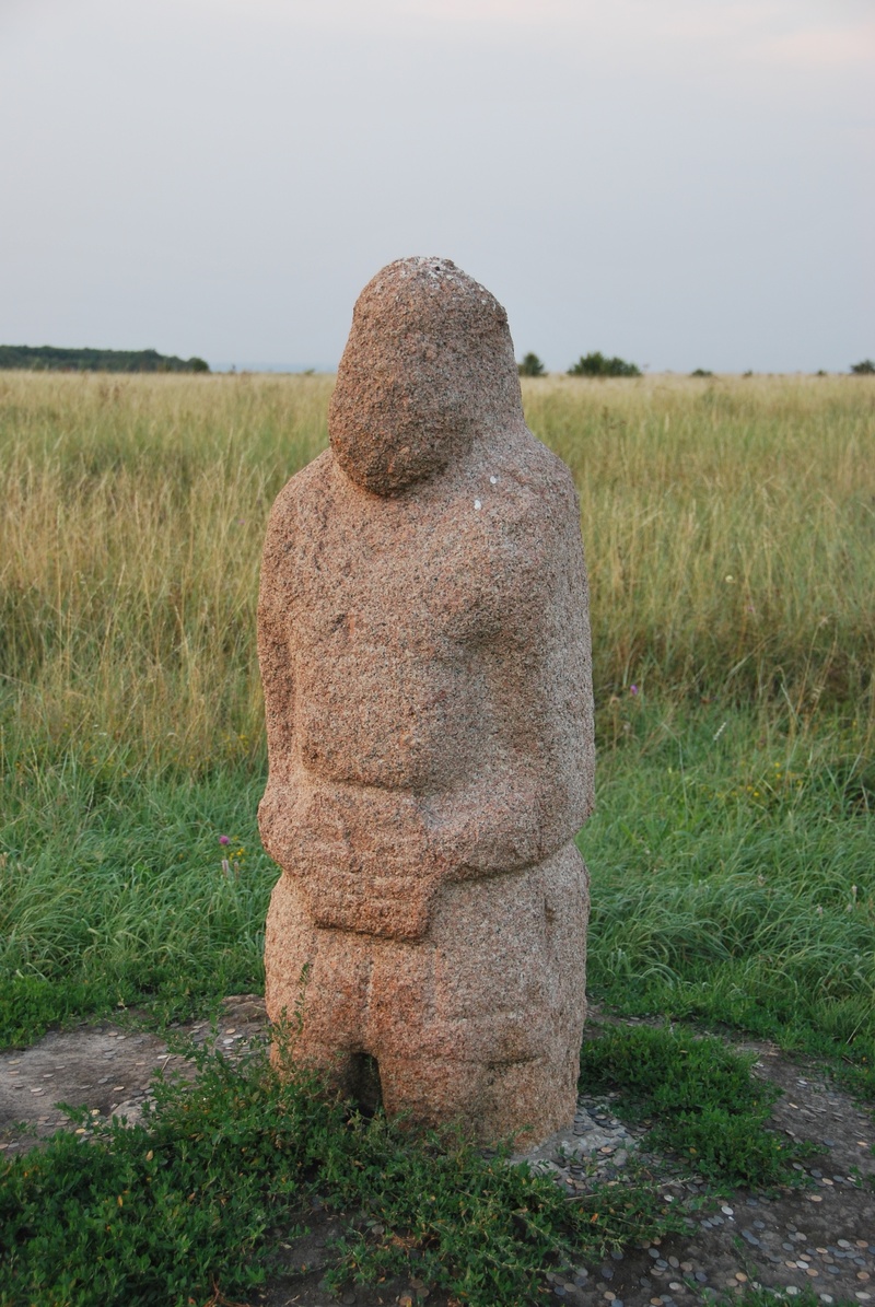 stone woman, environment, day, plant, tranquil scene, green color, human representation, grass, solid, ancient artifact, tranquility, landscape, showplace