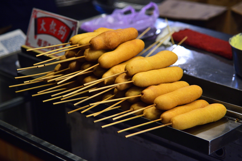 hot dog, focus on foreground, street food, fast food, market, ready-to-eat, close-up, skewer, barbecue, 5K, sausage, tray, snack, no people, business