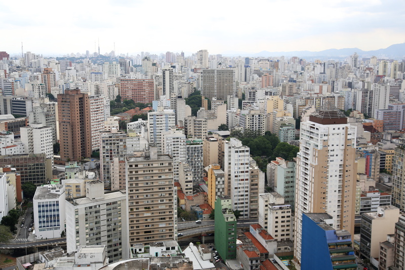 sky, day, building, building exterior, nature, crowd, crowded, urban skyline, apartment, residential district, skyscraper, high angle view, modern, office building exterior