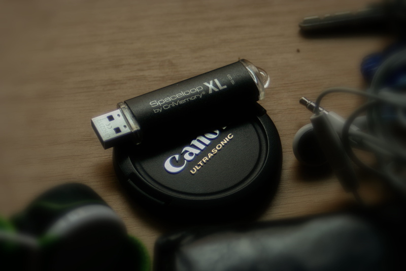 flashdrive, arts culture and entertainment, stick, pen, selective focus, lens - optical instrument, 2K, no people, usb, camera - photographic equipment