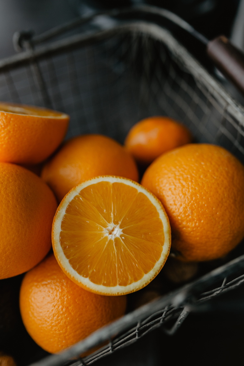 food and drink, halved, no people, focus on foreground, close-up, indoors, food, basket, fruit, still life, breakfast, orange - fruit, orange color, vitamin