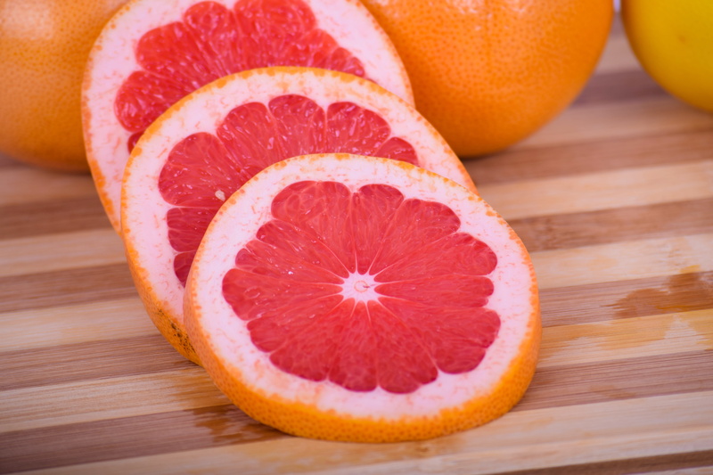 blood orange, ripe, indoors, focus on foreground, vegan, grapefruit, healthy eating, 5K, orange, fruits, citrus fruit, cross section, group of objects
