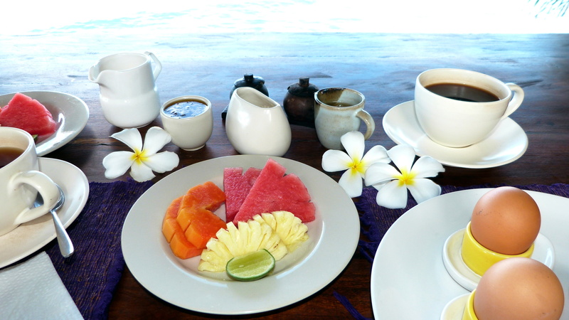 plate, meal, eggs, coffee cup, table, flowers, place setting, top, bali, holidays, refreshment, food, food and drink, coffee, cup, pineapple, indoors, variety
