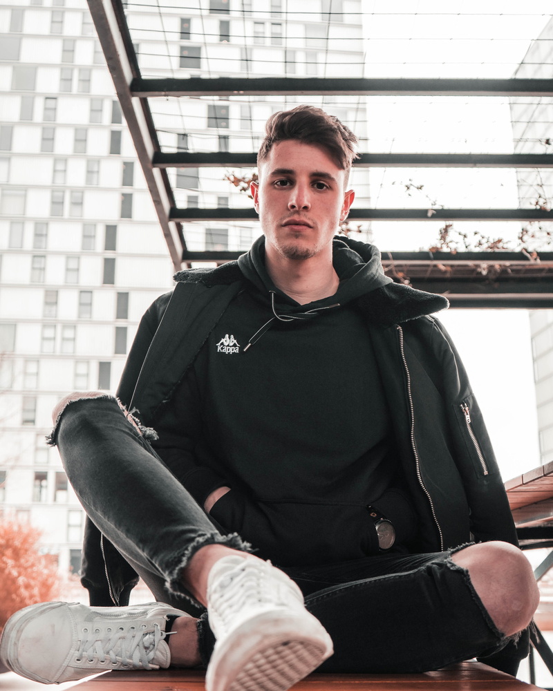 leather, model, black color, weather, confidence, needsleep, 4K, casual clothing, real people, young adult, sitting, kappa, fashion, tired, outside, rain