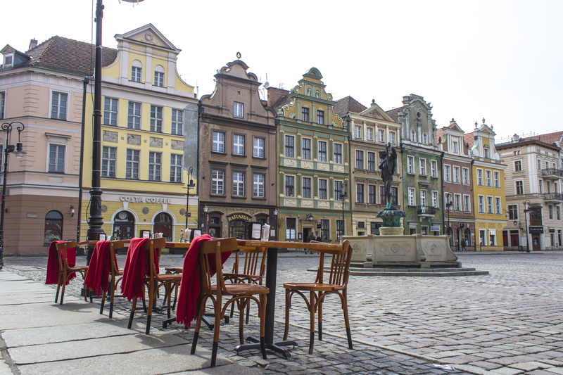 table, cobblestone, sidewalk cafe, sky, building exterior, 4K, clear sky, street, building, colors, old, poland, poznan, outdoors, no people, seat, cafe