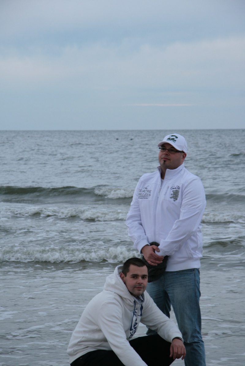 lifestyles, males, cloudiness, outdoors, couple - relationship, people, sea, care, men, young adult, casual clothing, two men, young men, scenics - nature