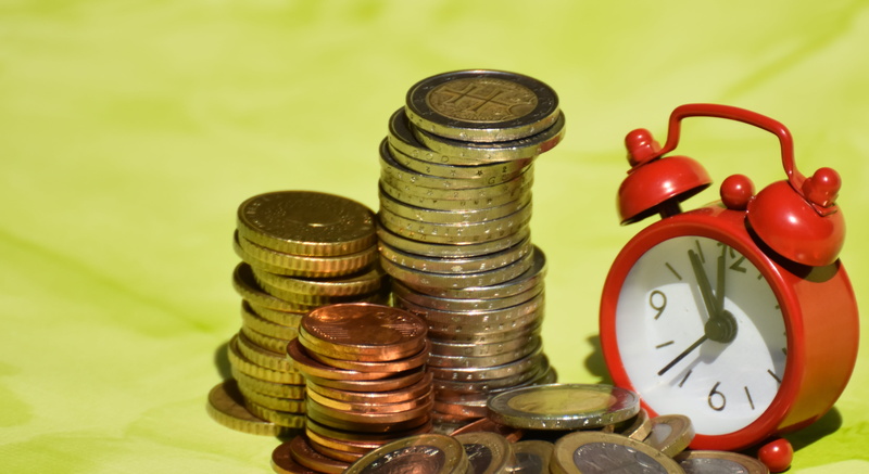 merit, savings, time, minute hand, wealth, coins, stack, finance, reserve, euro, shiny, business, money, still life, coin, indoors, alarm clock, no people