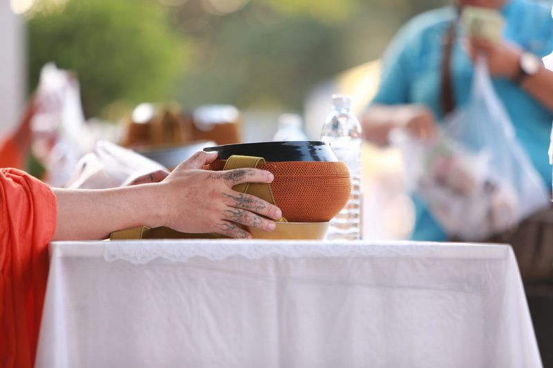 adoration, outdoors, for priests, refreshment, พระ, a pilgrimage, event, put, human hand, merit, real people, midsection, women, bat, buddhism, food and drink