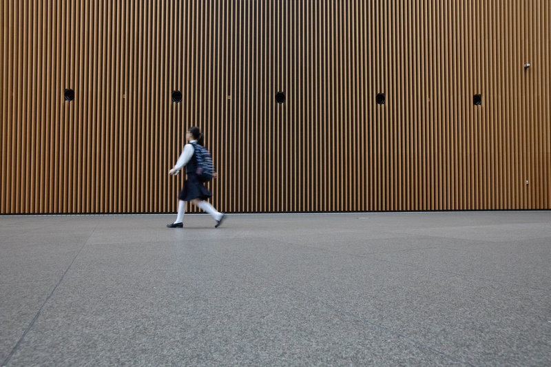 one person, chiyoda-ku, rear view, concrete, school, uniform, tokyo, pattern, men, gray, leisure activities, sunlight, motion, real people, motion blur
