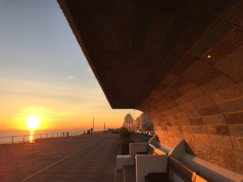 sun, outdoors, building exterior, perspective, connection, road, travel, built structure, transportation, bridge, sky, orange color, architecture, nature