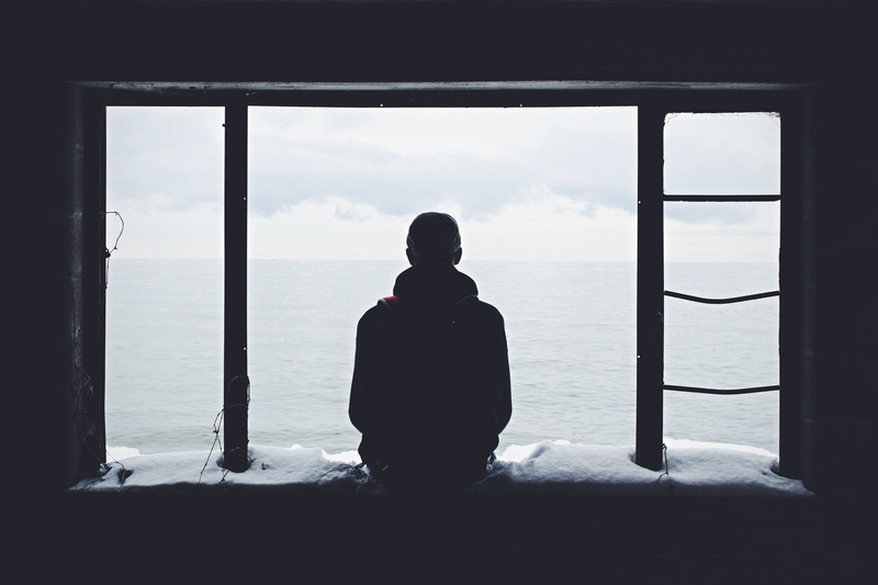 sky, window, sitting, silhouette, royalty  images, rear view, lifestyles, glass - material, person, man, transparent, real people, 5K, ocean, water, indoors