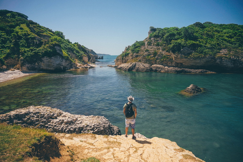 sea, one person, mountains, 4K, digital nomad, blue, agva, scenics - nature, solid, man with hat, casual clothing, nature, water, outdoors, lifestyles