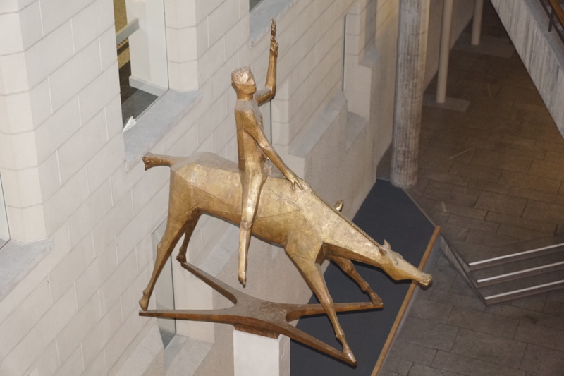 animal themes, railing, day, seat, domestic animals, built structure, domestic, wood - material, prison, sculpture, one animal, indoors, mammal, Zurich