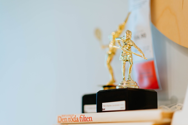 representation, human, toy, indoors, statue, craft, close-up, coat rack, file, gold, gold medal, platinum, digital clock, focus on foreground, french door