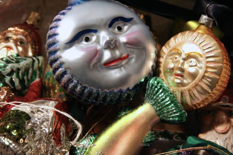 sphere, crowd, celebration, figurine, male likeness, belief, aluminium, human representation, sculpture, spirituality, multi colored, statue, creativity