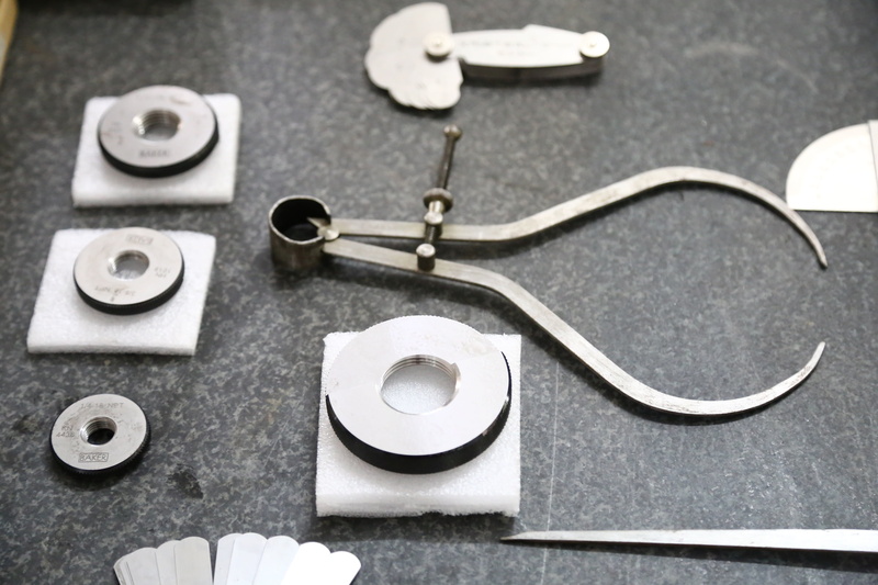 textile, lab, group of objects, table, engineering, studio shot, still life, scissors, geometric shape, metal, scale, power, meter, tool, measuring, work tool