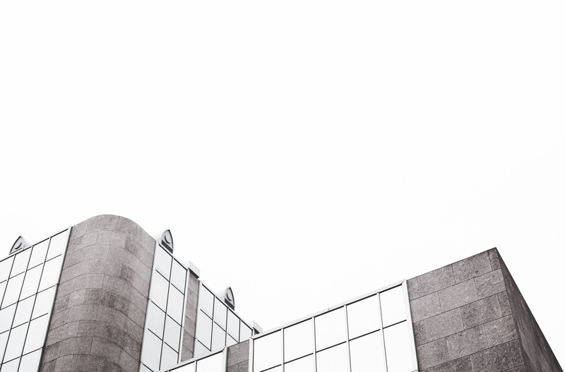window, business, glass - Material, high, building, grey, modern, building Exterior, clear sky, sport, low angle view, copy space, facade, boundary, nature