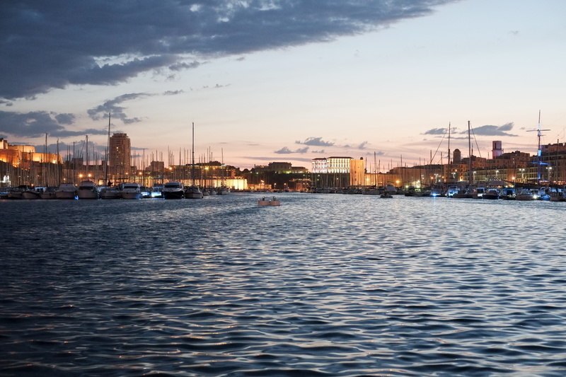 illuminated, building exterior, nautical vessel, outdoors, cloud - sky, sightseeing, holiday, urban Scene, rippled, skyscraper, summer, view, boat, river