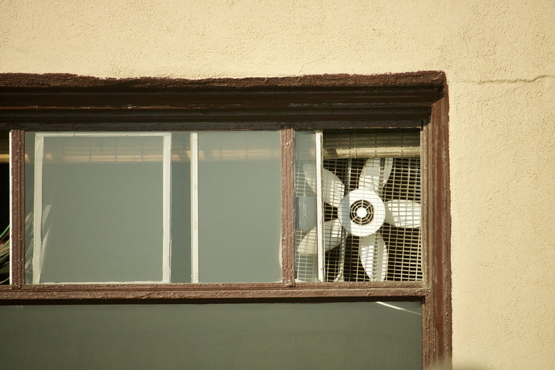 house, building exterior, close-up, fan, window frame, glass, shape, metal, attached, fam, built structure, safety, outdoors, building, no people, architecture