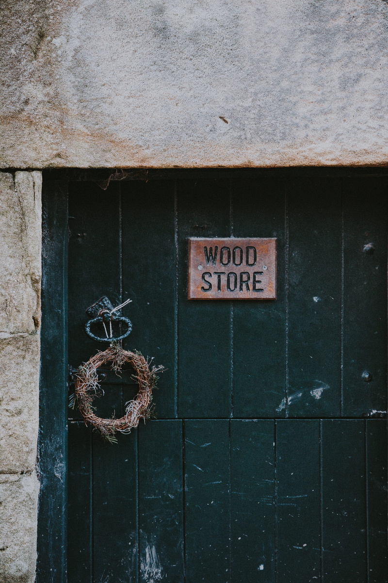 building, wood - material, day, rusty, entrance, western script, no people, building exterior, door, communication, wood, wall - building feature, metal