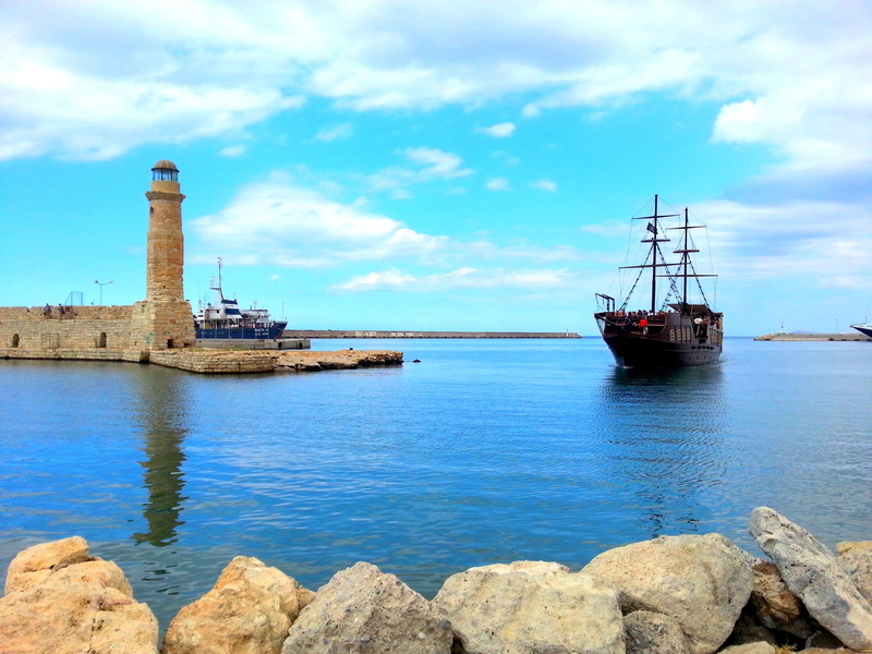building exterior, boat, transportation, sailboat, sea, outdoors, ship, cloud - sky, reflection, no people, day, rethymno, nature, built structure, architecture