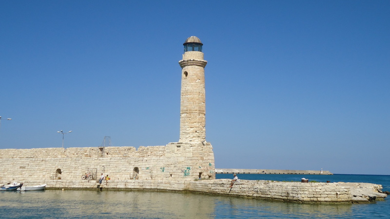 clear sky, coastline, rethymno, harbor, sea, architecture, mole, building exterior, memorial, day, sky, crete, built structure, port, tall - high, outdoors