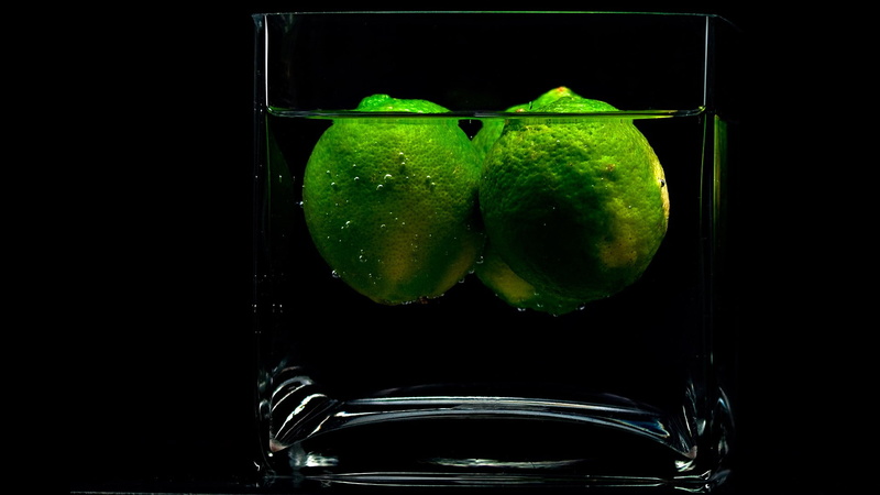 no people, still life, cocktails, healthy eating, food and drink, lime, glass - material, food, drink, transparent, floating on water, freshness, black background