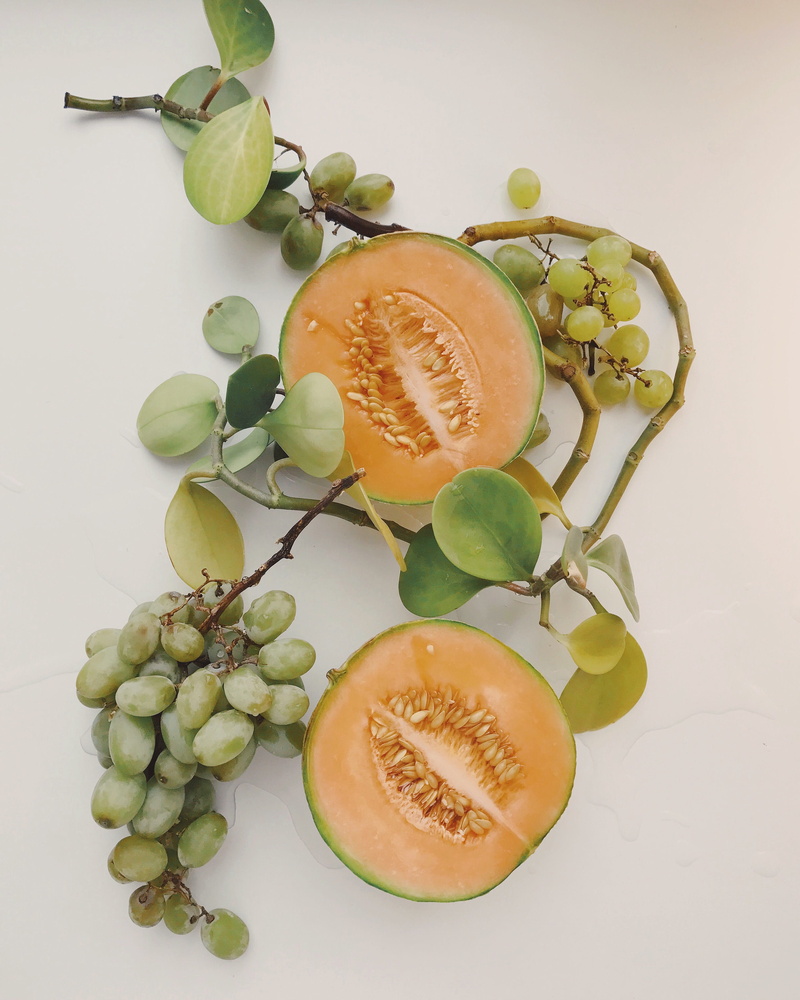 directly above, 2K, half, melons, juicy, seeds, fruits, citrus fruit, text, plant part, high angle view, leaf, nutrition, food, fresh fruit, orange, close-up