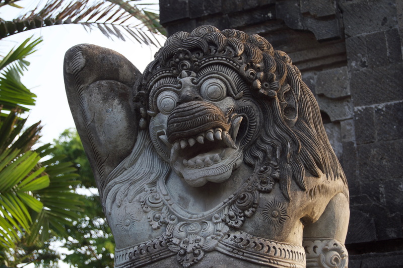 stone material, statue, low angle view, built structure, close-up, day, no people, solid, bali, focus on foreground, carving, creativity, craft, carving - craft product
