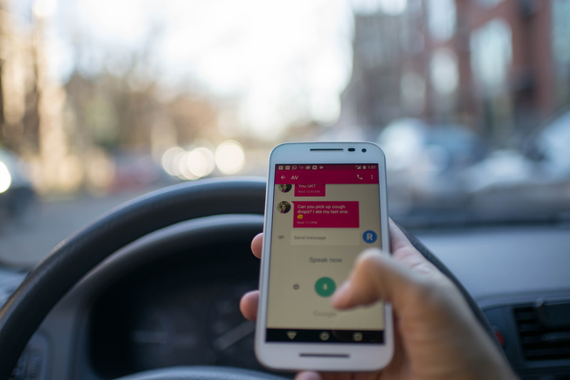 transportation system, vehicle, mobile app, adult, screen, human body part, portable information device, communication, close-up, connection, technology